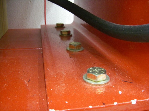 Bolts holding the frame together.